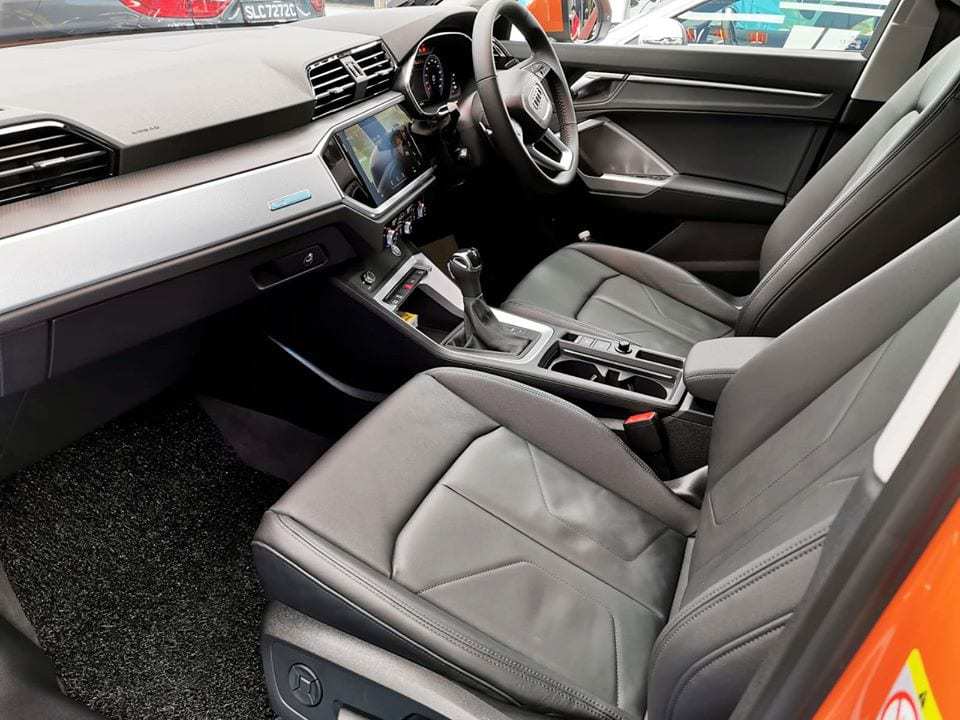 An Audi Q3 - front seat