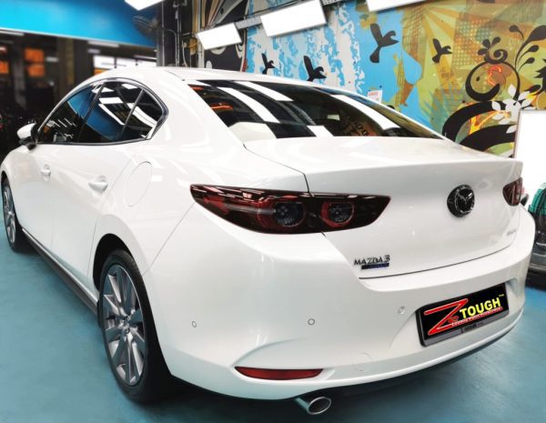 A Good Looking White Mazda 3 with Treatment of Ceramic Paint Protection ...